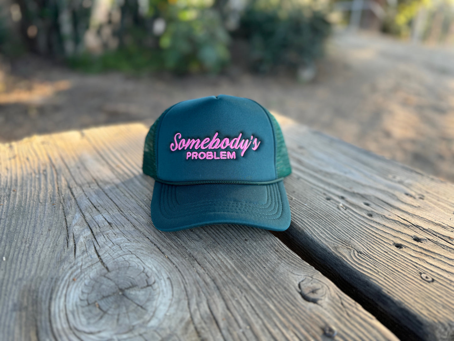 Somebody's Problem Teal/Pink Trucker Hat
