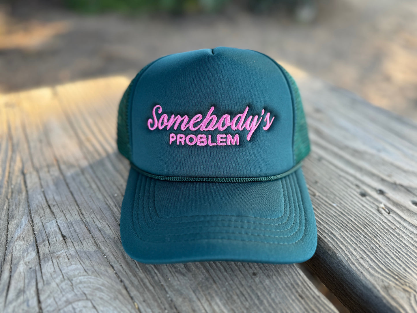 Somebody's Problem Teal/Pink Trucker Hat