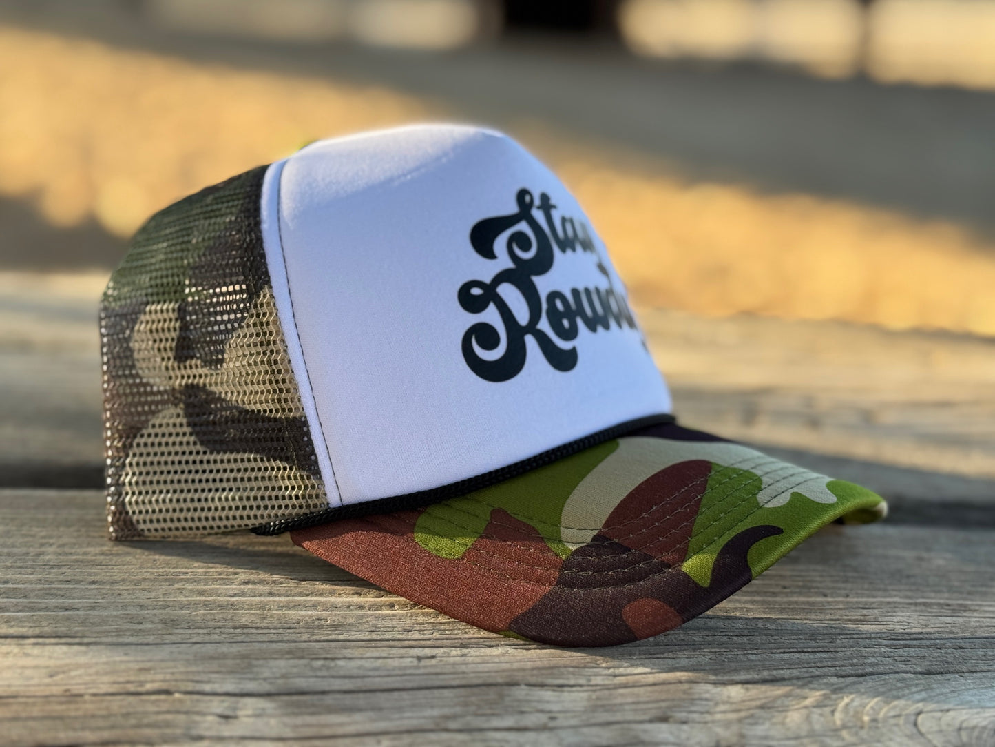 STAY ROWDY trucker hat.