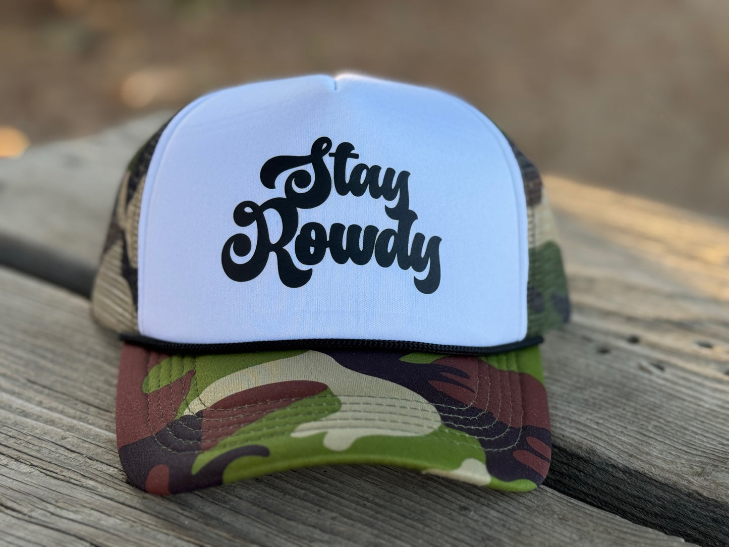 STAY ROWDY trucker hat.